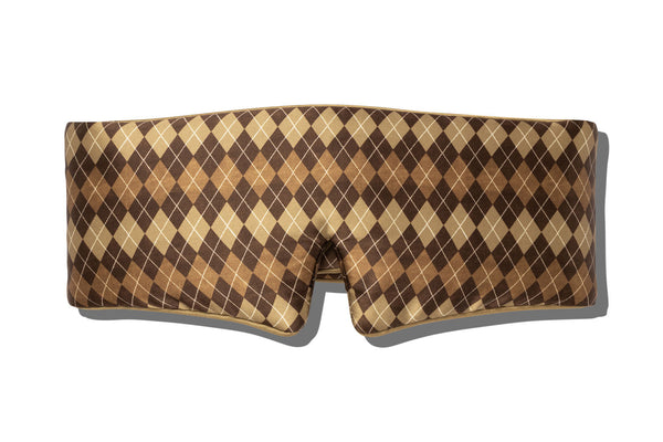 Blockout sleep mask with an argyle pattern in shades of brown, tan, and beige, shown against a plain white background with a soft drop shadow.