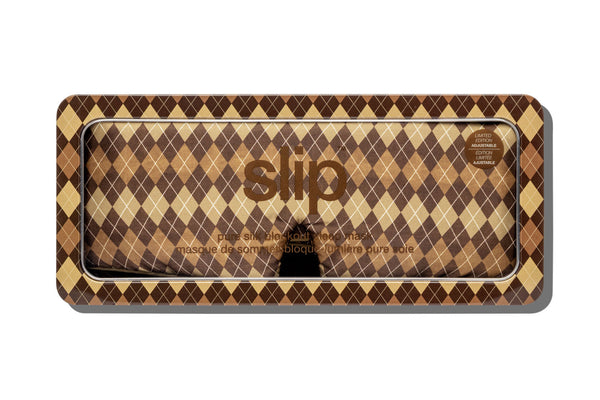 Slip Blockout Sleep Mask in a rectangular tin with a brown and beige argyle pattern, shown on a white background.