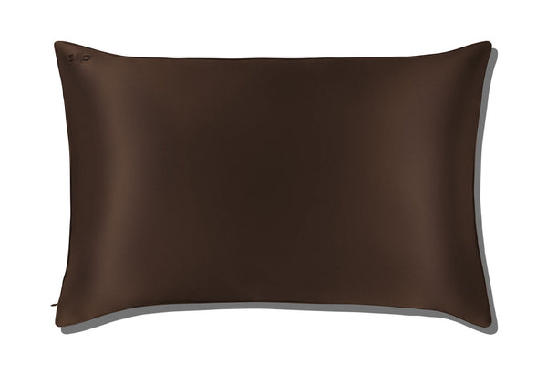A dark chocolate brown silk pillowcase,  shown from a top-down perspective on a white background with a soft drop shadow.